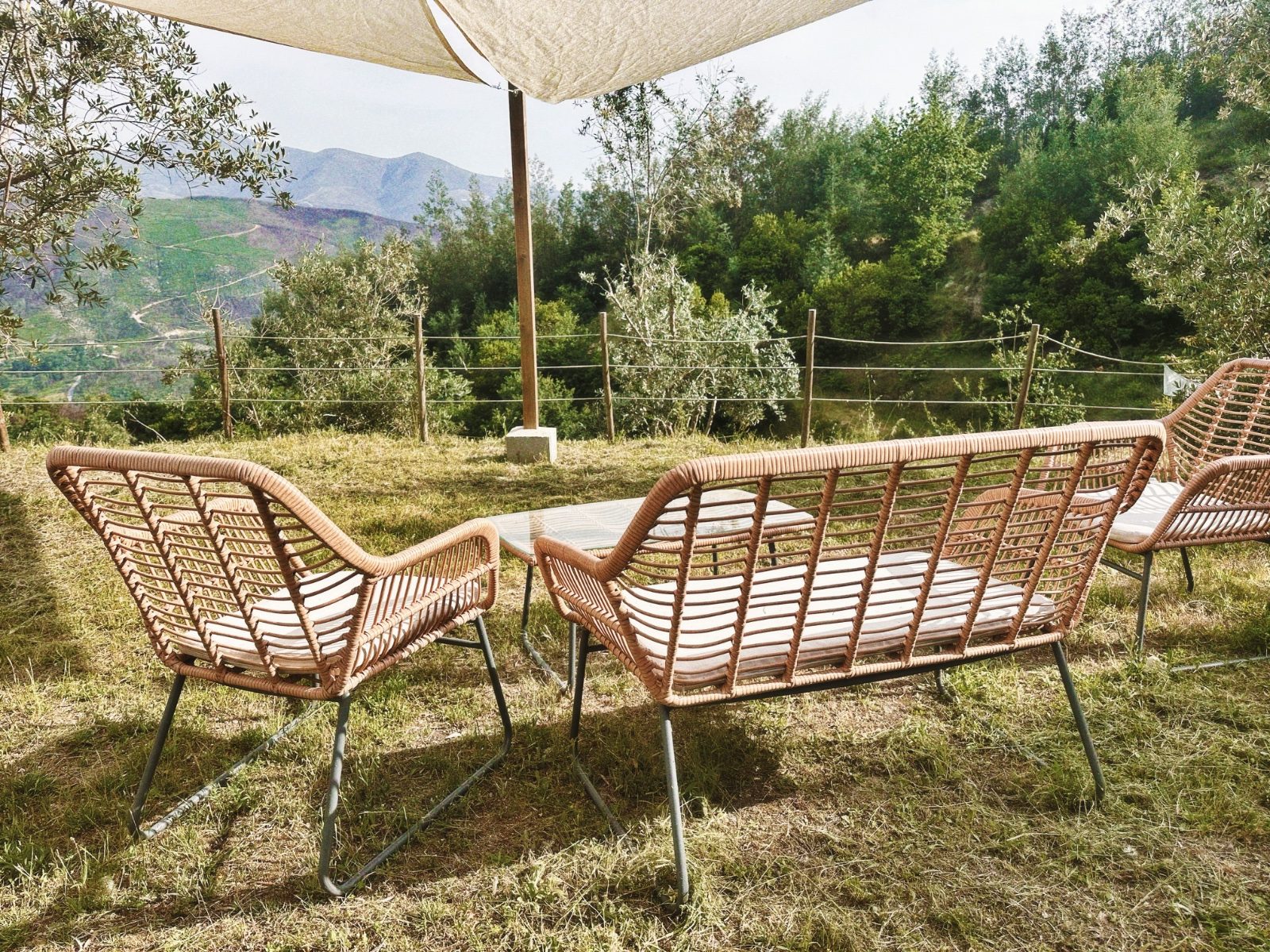 Garden seating facing the mountains at Hirundo Village
