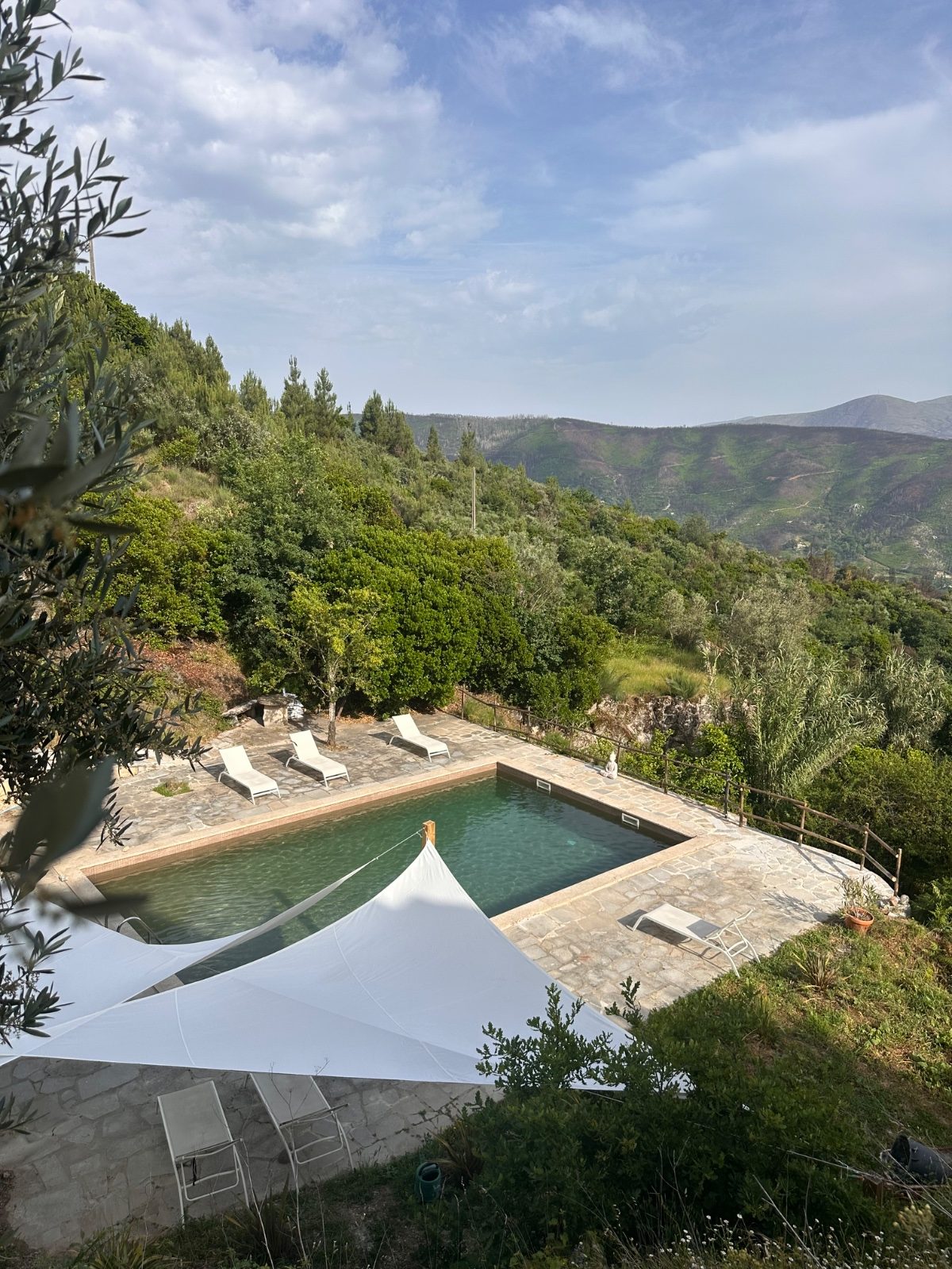 The pool at Hirundo Village above the valley