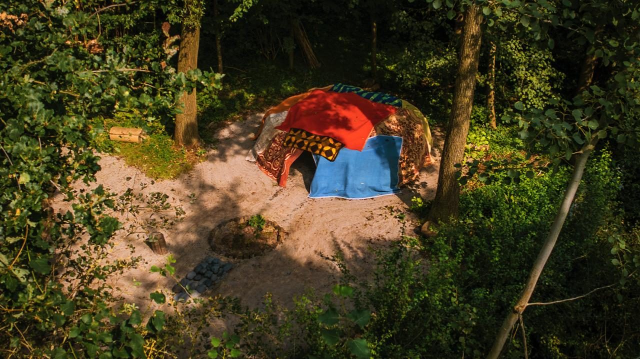 A sweat lodge among the trees